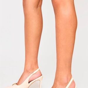 TWO PAIRS OF SLING BACK HEELS